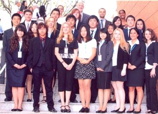 Students and delegates pose for a group photo at the Model United Nations Conference, Bangkok.